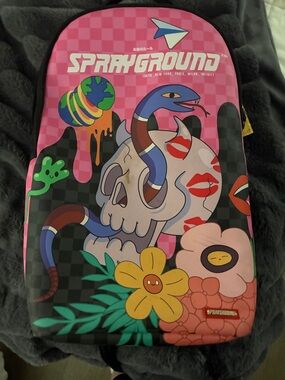 Sprayground Pink Skull & Snake Graphic Backpack with Floral Accents